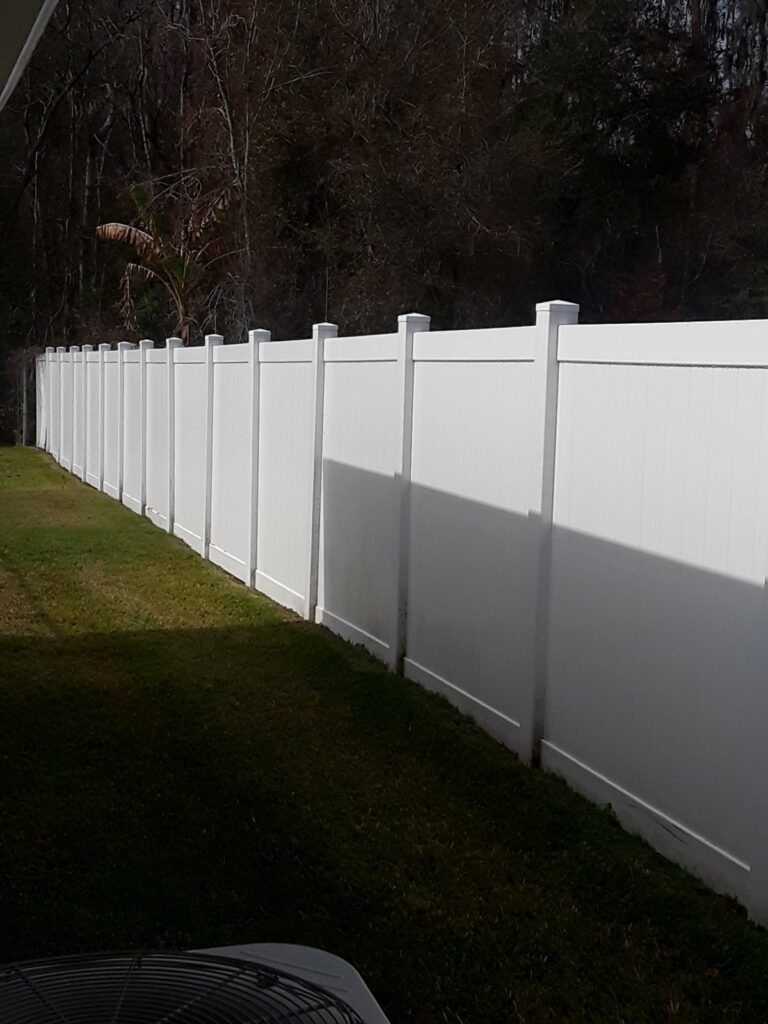 White Vinyl Privacy Fence Installation in Lutz, Florida